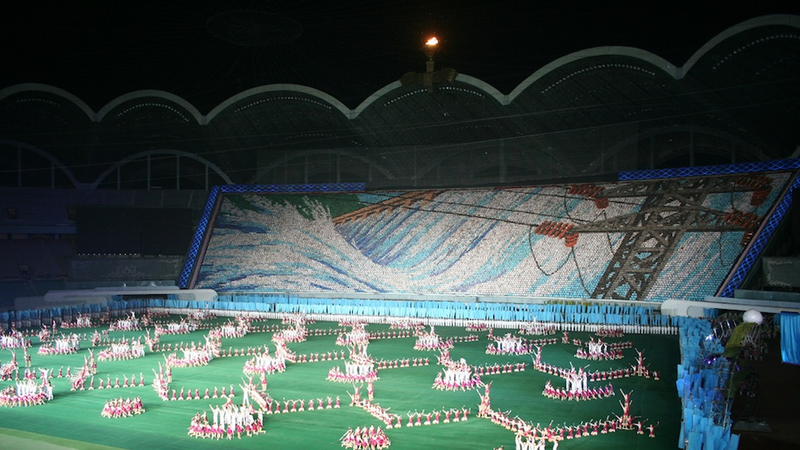Illustration for article titled The Amazing, Colorful Flip Card Propaganda Mosaics of North Korea